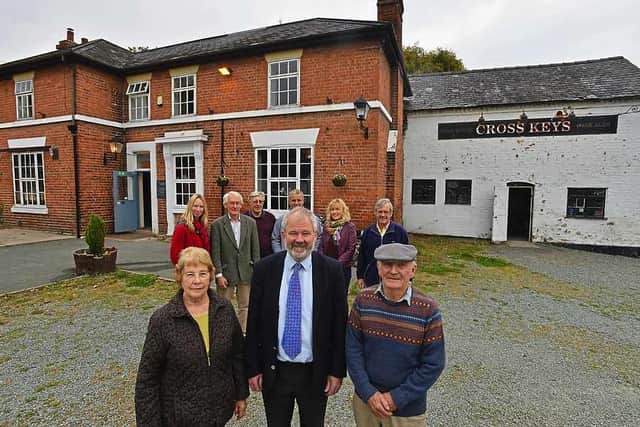 Cross Keys Action Committee members at the pub in Kinnerley