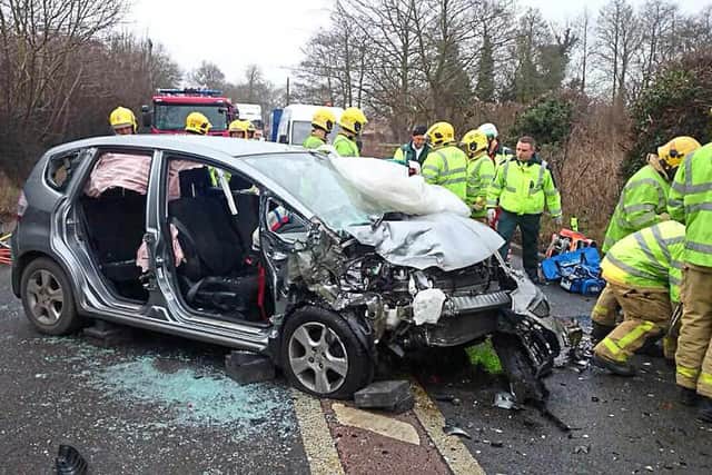 Mr Holden was cut free from the mangled wreckage of his car