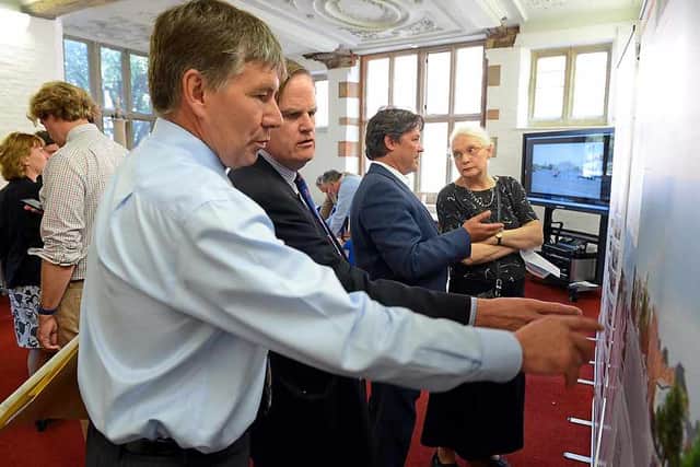 Visitors take a look at the plans for students hall in Shrewsbury at an event in Rowley's House