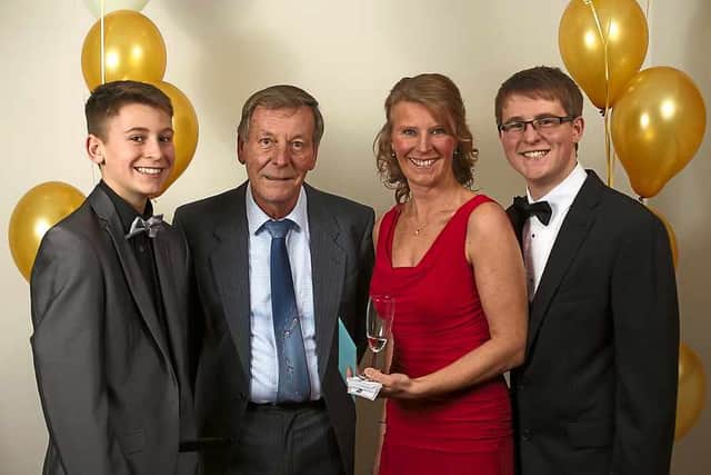 A family united in grief and pride – grandson Matty Exton, husband Jim Groves, daughter Mandy James and Ben Exton