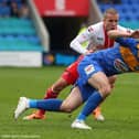 Bahrudin Atajic of Shrewsbury Town and Jimmy Smith of Stevenage 