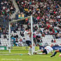 Shaun Miller of Shrewsbury Town scores a goal to make it 2-1.