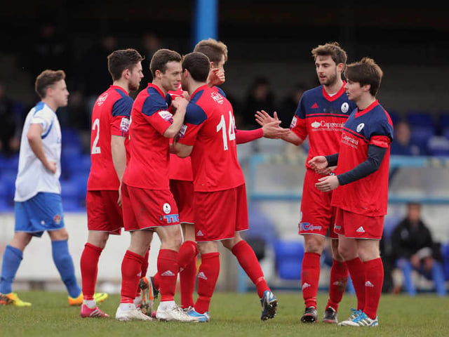 Shaun Whalley of AFC Telford United celebrates after scoring a goal to make it 2-4 with his team-mates