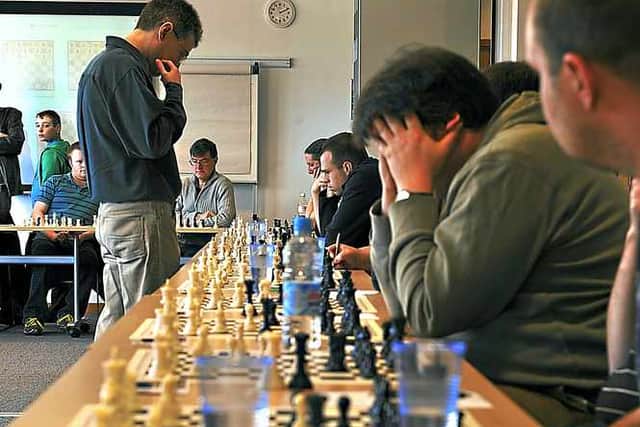 Michael Adams contemplates a move
