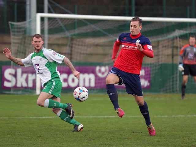 Adam Farrell of AFC Telford United and Gregg Anderson of North Ferriby United