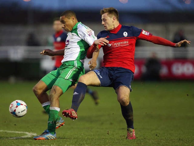 Jonathan D'Laryea of North Ferriby United and Adam Farrell of AFC Telford United