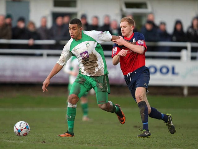 Anthony Wilson of North Ferriby United and Mike Grogan of AFC Telford United