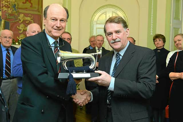 Presenting a bugle to Peter Duckers was Lt Col (ret) Nick Jenkins