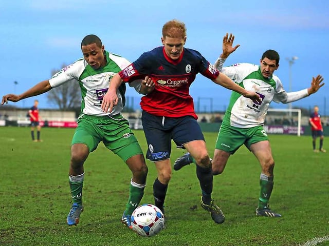 Mike Grogan of AFC Telford United and Jonathan D'Laryea and Danny Clarke of North Ferriby United
