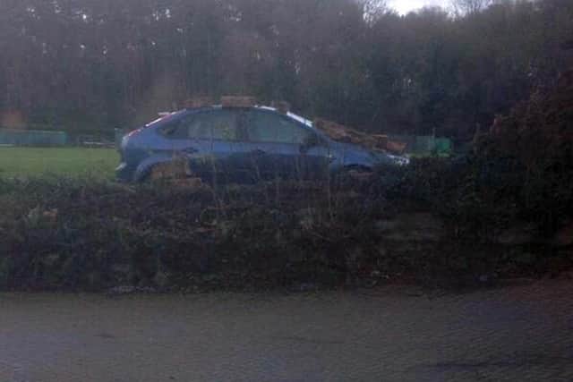 Heavy winds caused a wall at Madeley's cricket club to fall on Paul Holland's car in the car park