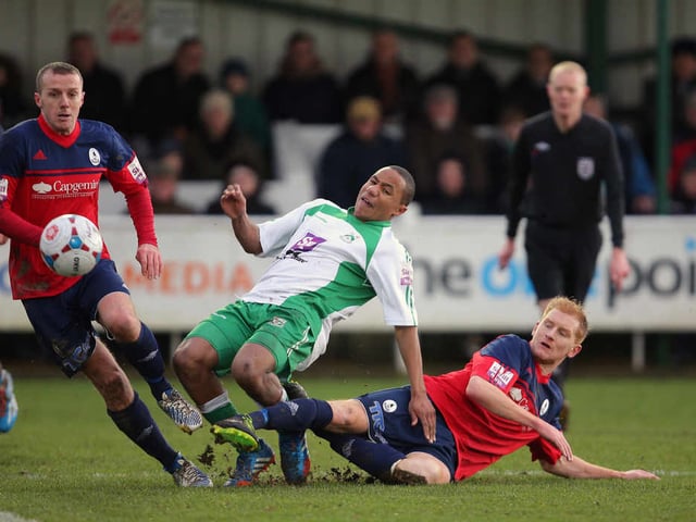 Jonathan D'Laryea of North Ferriby United and Mike Grogan of AFC Telford United
