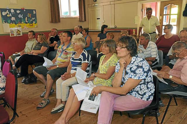 The public meeting on the housing schemes was packed with villagers 