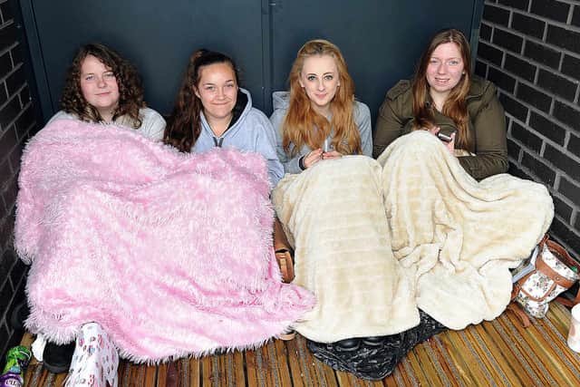 Laura Cunningham, Bethany Ambrose, Chloe Bythell and Jessica Cotterill wait to buy tickets