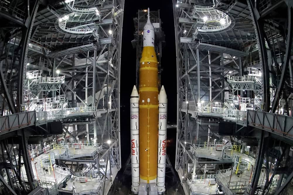 The NASA Artemis II rocket with the Orion spacecraft aboard leaves the Vehicle Assembly Building ahead of launch, hopefully this week