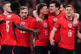 Ben White (centre) celebrates