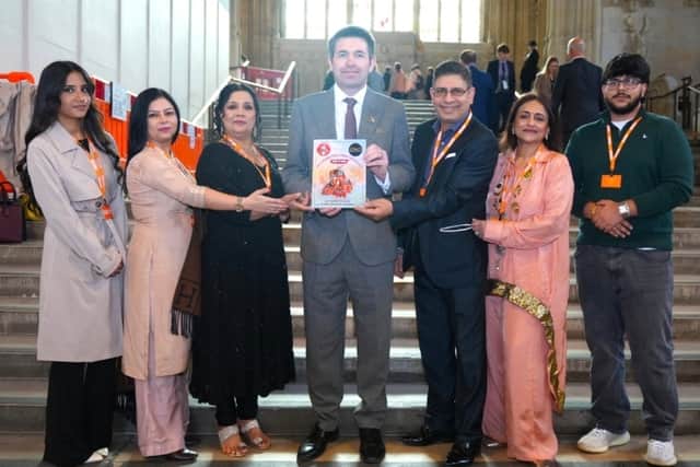 Shaun Davies earlier this month with organisers of the International Giddha Competition