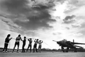 PICTURE FROM THE ARCHIVE: In 1990, sixth-formers at the Royal Wolverhampton School gave their charity appeal a supersonic boost by pitting their strength against a Jaguar jet. More than 20 pupils joined forces to haul the aircraft 500 yards across the tarmac at RAF Cosford in a strongman stunt. The sponsored challenge was the latest in a series of events being held as part of the teenagers’ annual Lenten Appeal.