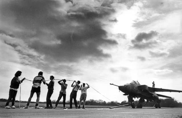 PICTURE FROM THE ARCHIVE: In 1990, sixth-formers at the Royal Wolverhampton School gave their charity appeal a supersonic boost by pitting their strength against a Jaguar jet. More than 20 pupils joined forces to haul the aircraft 500 yards across the tarmac at RAF Cosford in a strongman stunt. The sponsored challenge was the latest in a series of events being held as part of the teenagers’ annual Lenten Appeal.