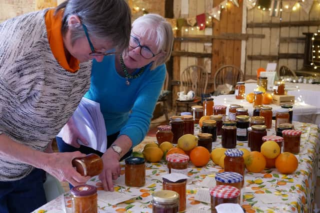 Jane in action judging at last year's Kington Marmalade Competition, with Pam Peek, one of the organisers of the event.