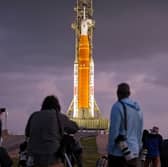  NASA's Artemis II moon rocket on Launch Pad 39-B just before sunrise at the Kennedy Space Center