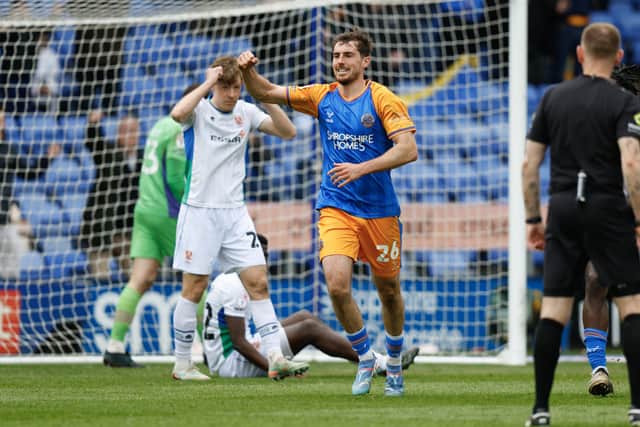 Sam Stubbs of Shrewsbury Town celebrates after scoring to make it 1-0