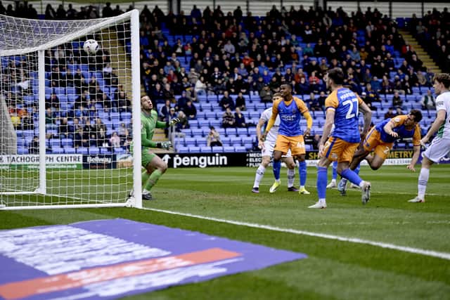 Sam Stubbs heads Shrewsbury Town ahead