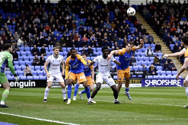 Sam Stubbs heads Shrewsbury Town ahead