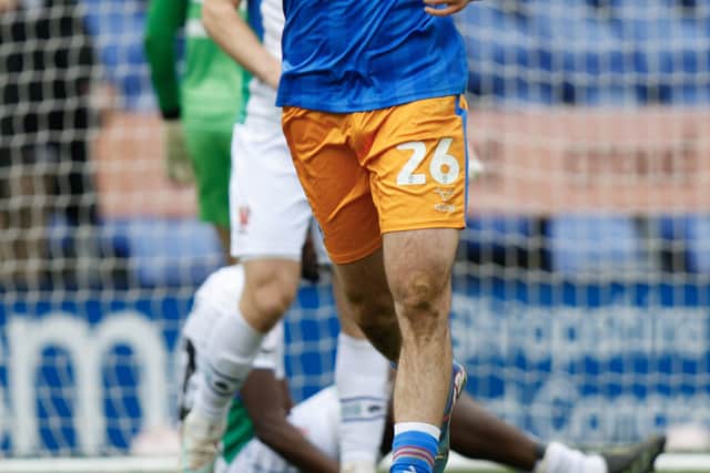 Sam Stubbs of Shrewsbury Town celebrates after scoring to make it 1-0