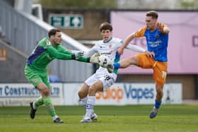 Iwan Morgan of Shrewsbury Town and Marko Marosi of Tranmere Rovers