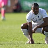 Adan George of AFC Telford United reacts at full time
