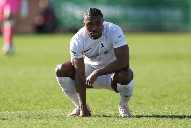 Adan George of AFC Telford United reacts at full time