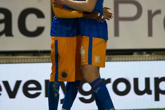 Bradley Ihionvien celebrates his goal with Tom Anderson