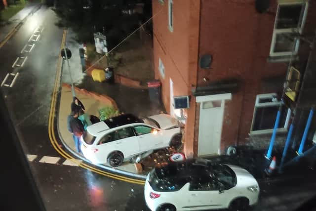 Neighbours evacuated and woman 'dragged' from car after Telford crash