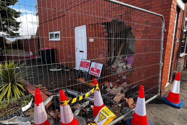 Neighbours evacuated and woman 'dragged' from car after Telford crash