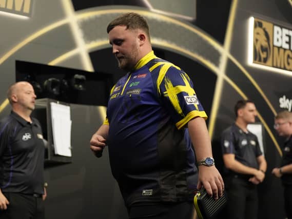 Luke Littler walks off stage