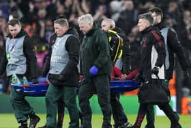 Hugo Ekitike is carried off injured