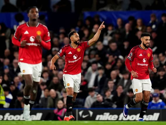Matheus Cunha, second right, celebrates