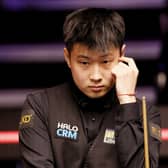 Zhao Xintong contemplates a shot at the Crucible.