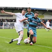 AFC Telford United's Matty Stenson battles for the ball against Darlington on Saturday
