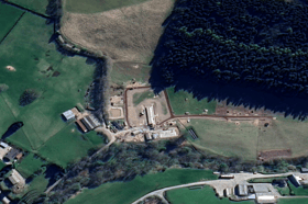 Shropshire Council said a house, outbuildings, engineering works, access tracks, a waterbody and other structures had been created without permission on the smallholding near Newcastle on Clun