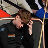 Stan Moody holds his head in disappointment