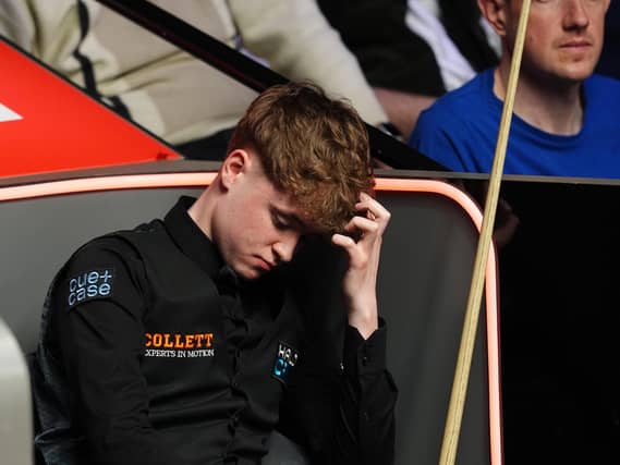 Stan Moody holds his head in disappointment