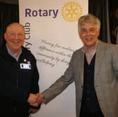 Paul (left) is welcomed to the club by president Johnathan Callwood who later thanked him for his talk.