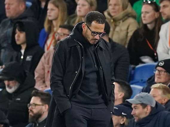 Chelsea manager Liam Rosenior looks frustrated on the touchline against Brighton