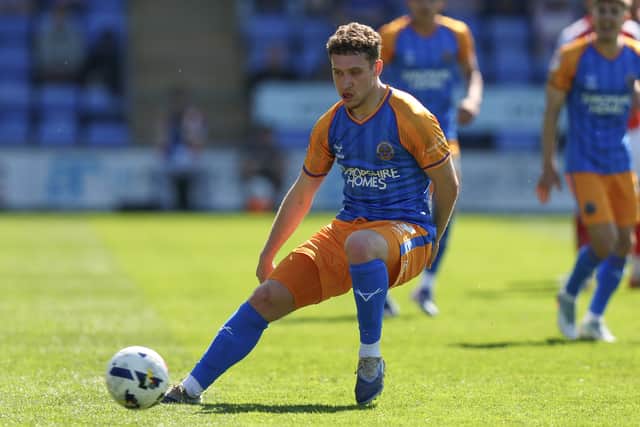 Iwan Morgan in action for Shrewsbury Town last season