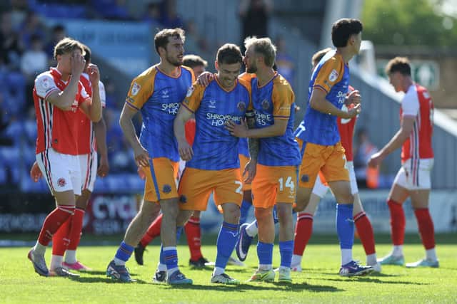 Josh Ruffels of Shrewsbury Town celebrates with his team-mates