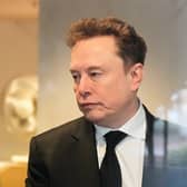 Elon Musk arrives at the US District Court in Oakland, California