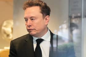 Elon Musk arrives at the US District Court in Oakland, California