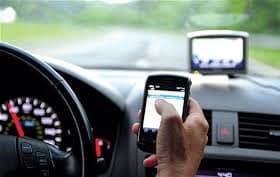 Using a mobile phone while driving is illegal and can be fatal.