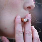A young woman smoking